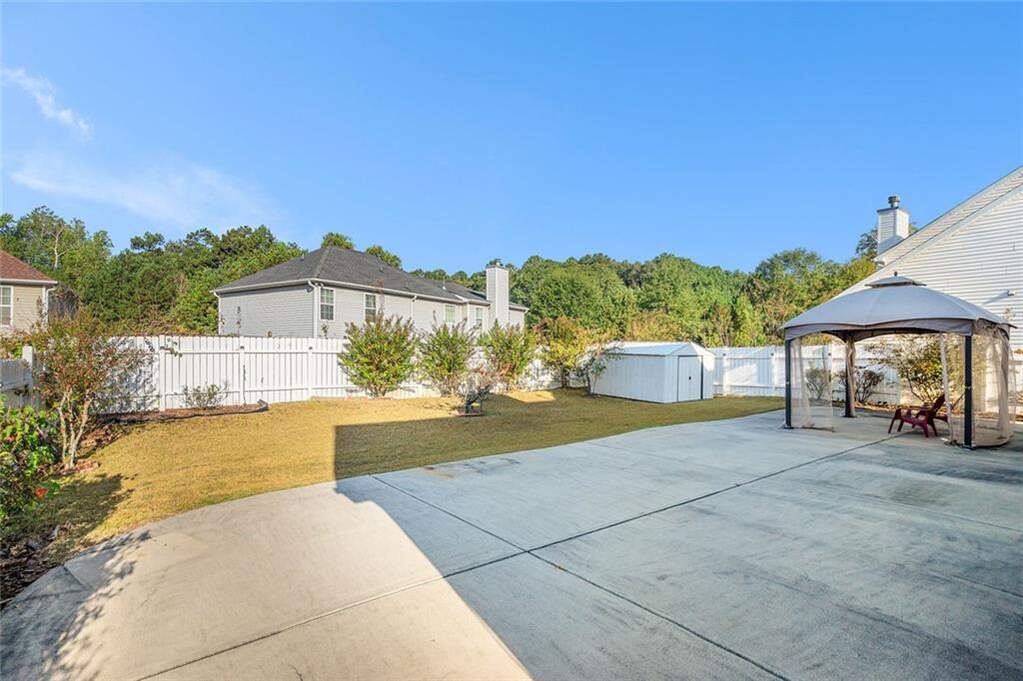 7492 Ferrara Drive, Lithonia, GA 30058 MLS 7663042 Ansley Real Estate